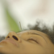 Flora Luyando receives acupuncture.
The Root TV video screenshot